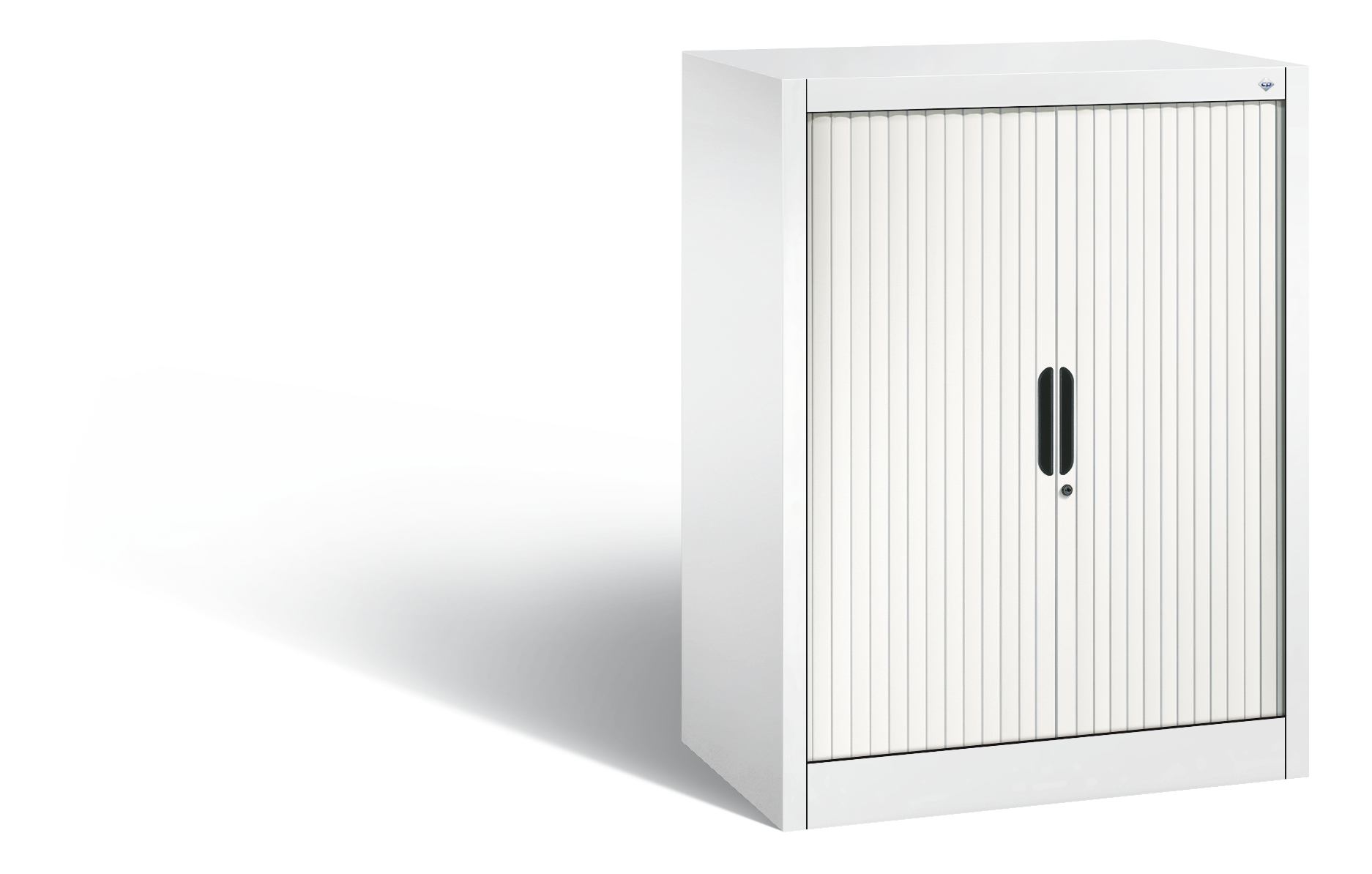 Weißer Schrank mit Rollladen, steht in leerem Raum.