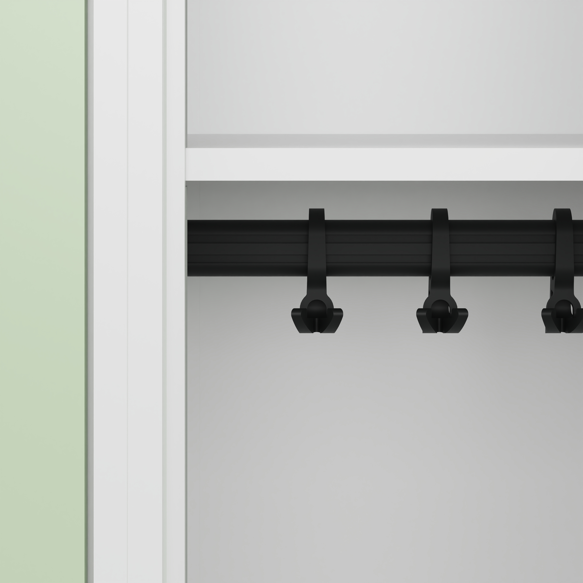 Schwarzes Aufhängesystem im Schrank vor weißem Hintergrund.